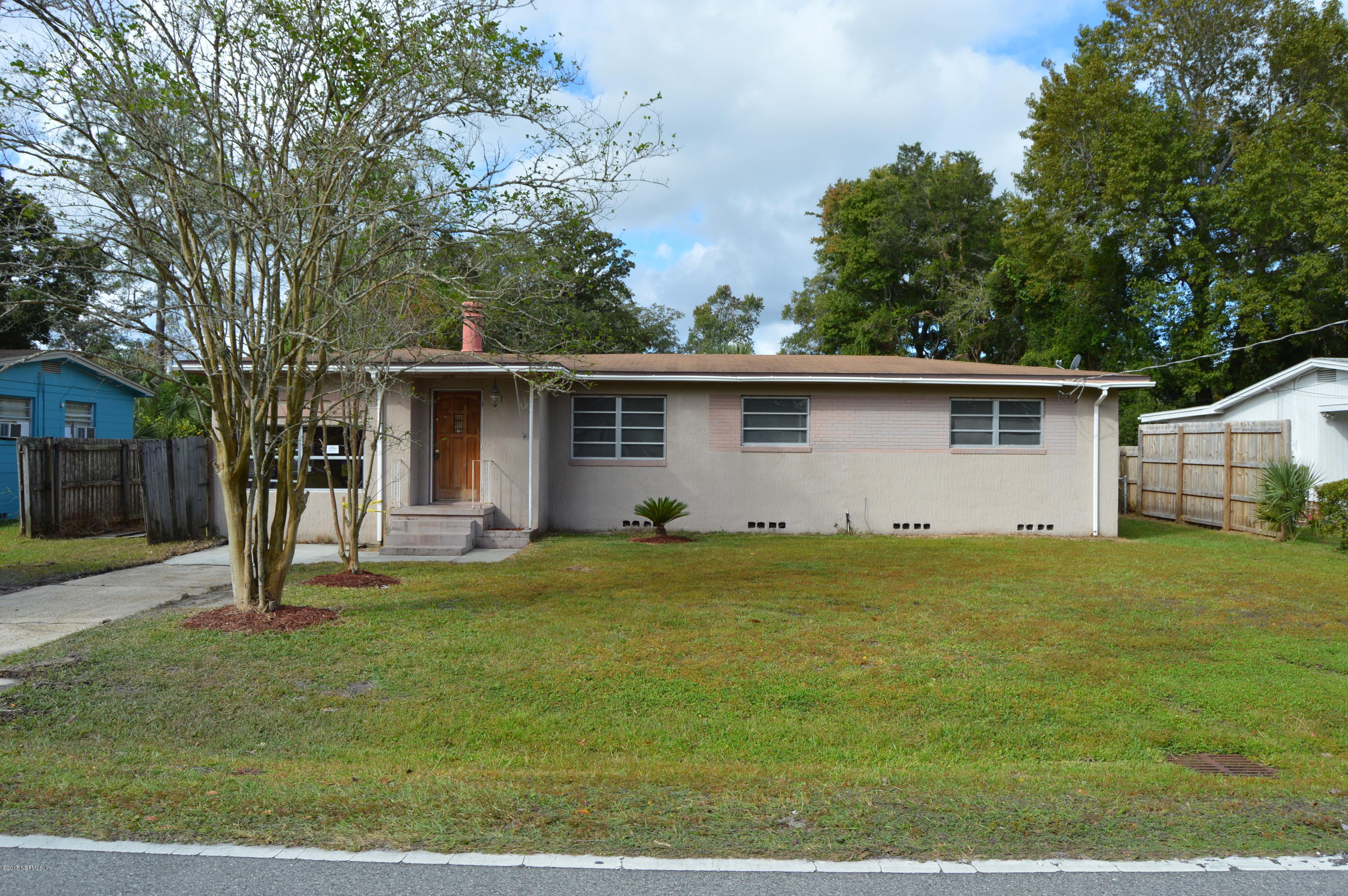 2236 Dean Road Jacksonville, FL 32216 - Photo 21 of 21 a view of a house with a yard