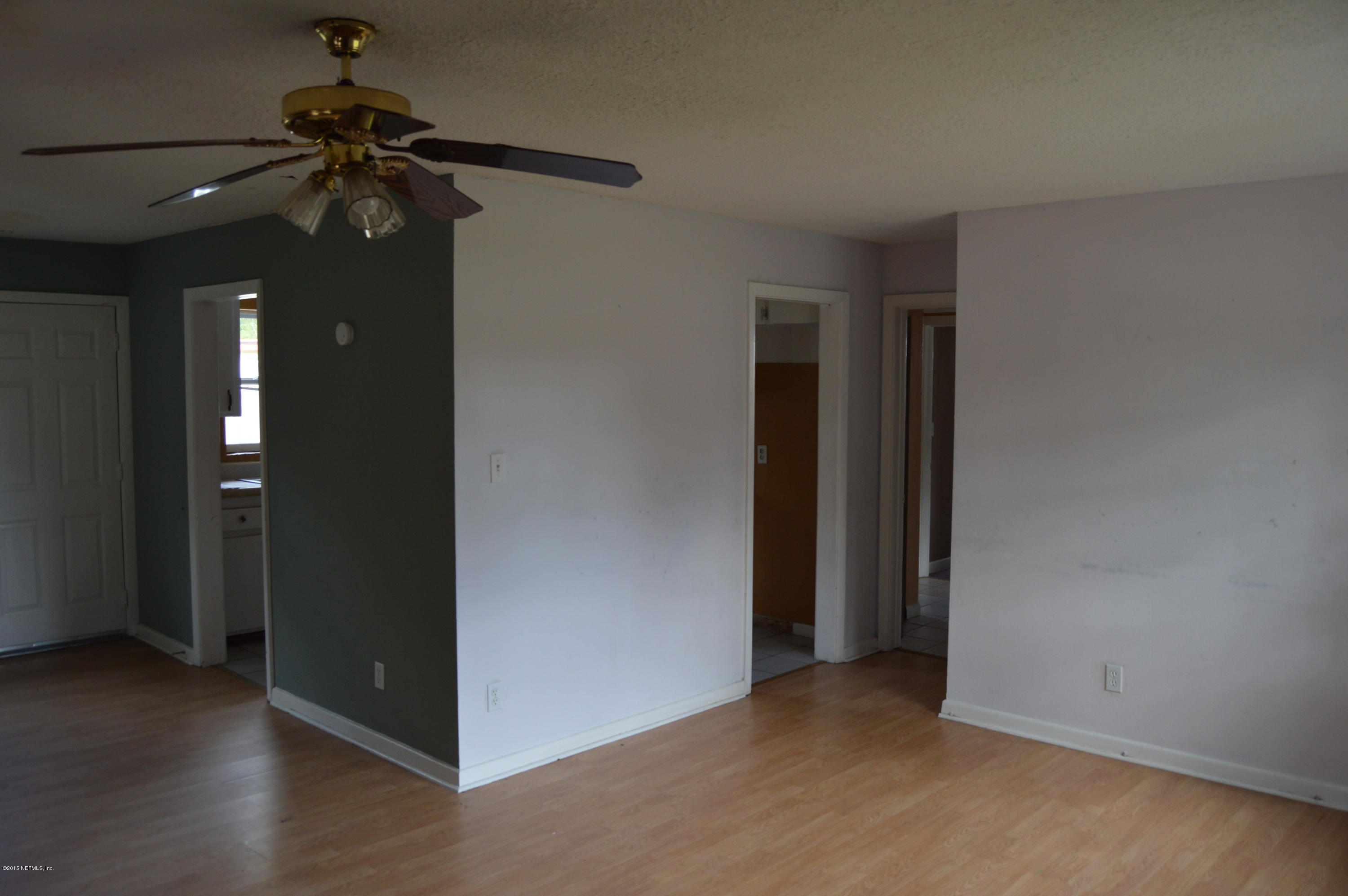 2236 Dean Road Jacksonville, FL 32216 - Photo 3 of 21 wooden floor in an empty room