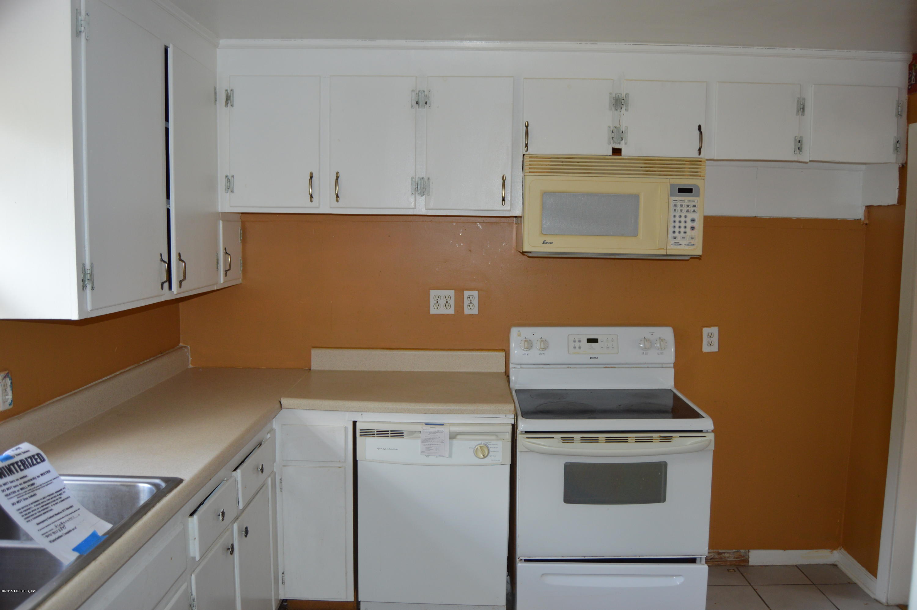 2236 Dean Road Jacksonville, FL 32216 - Photo 10 of 21 a utility room with dryer and washer