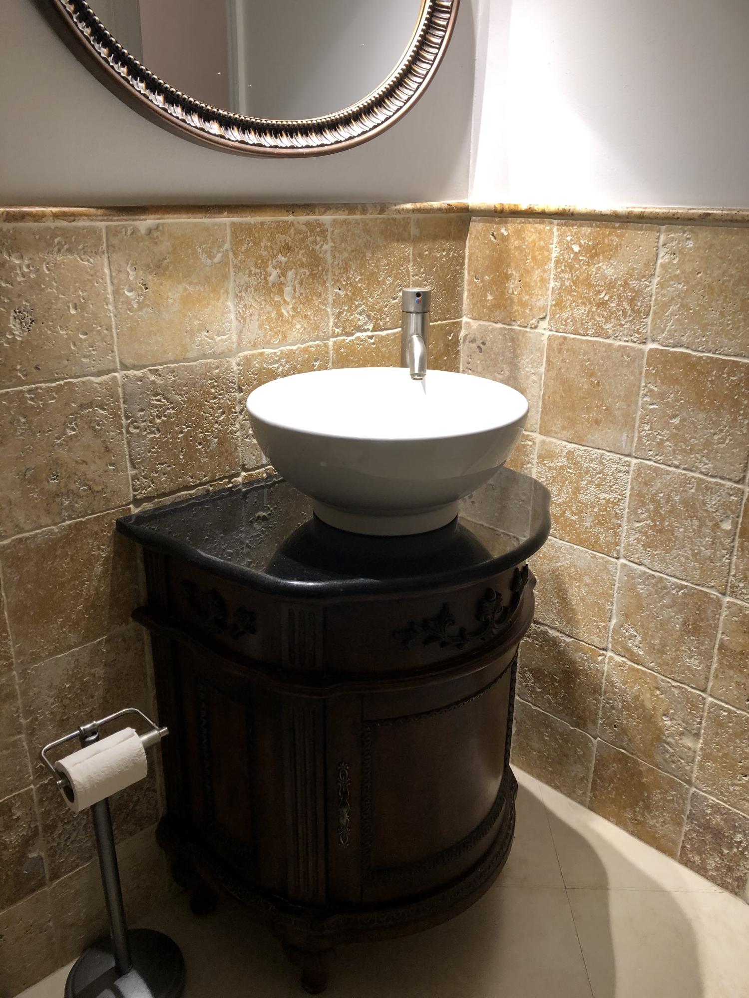 1291 Northwest 13th Street, Unit 346D Boca Raton, FL 33486 - Photo 11 of 15 a bathroom with a sink and a mirror