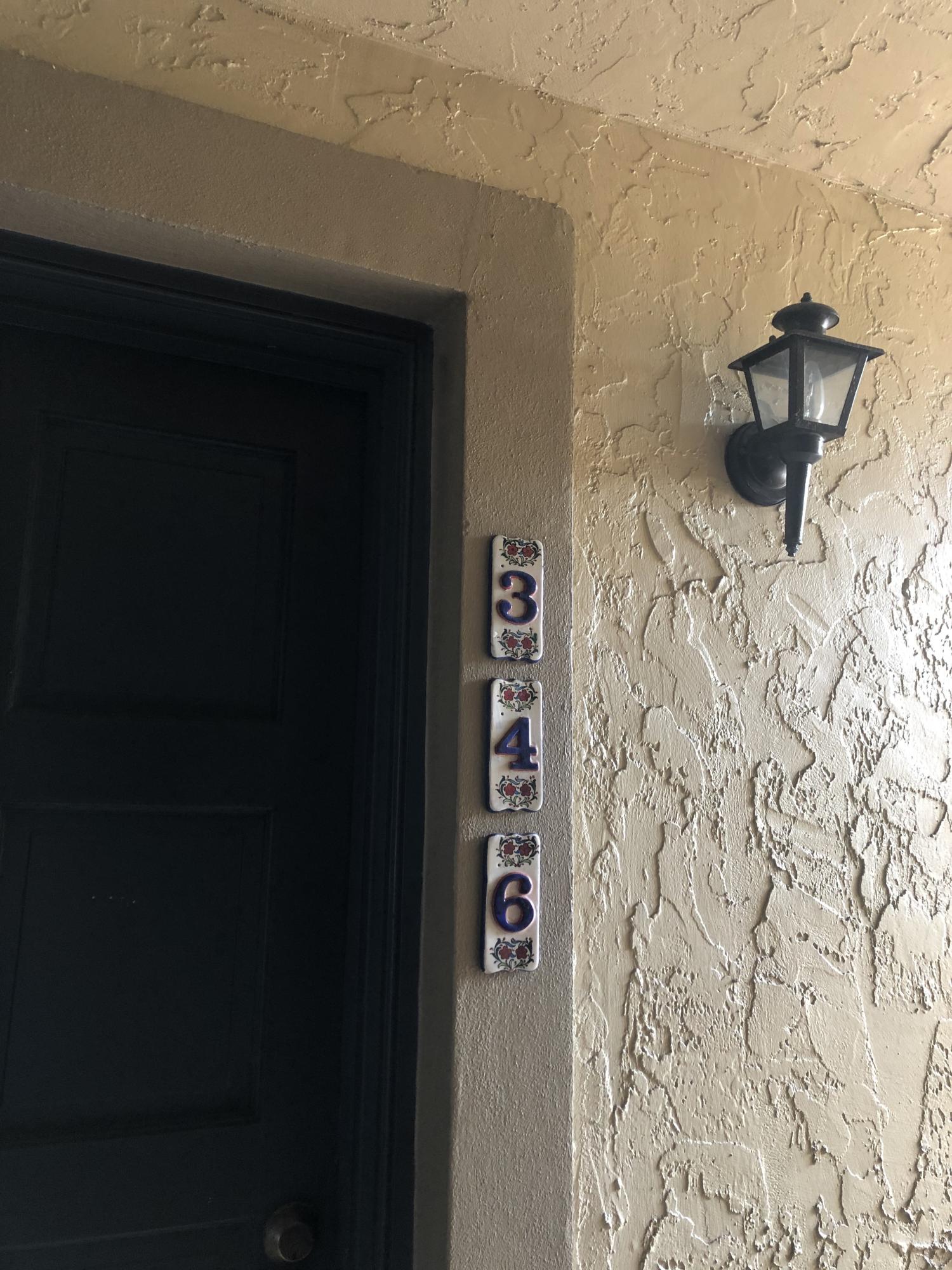 1291 Northwest 13th Street, Unit 346D Boca Raton, FL 33486 - Photo 2 of 15 a bathroom with a shower and a sink