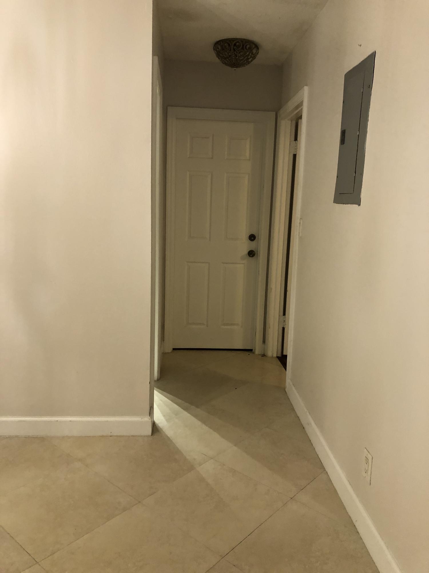 1291 Northwest 13th Street, Unit 346D Boca Raton, FL 33486 - Photo 9 of 15 a view of an empty room