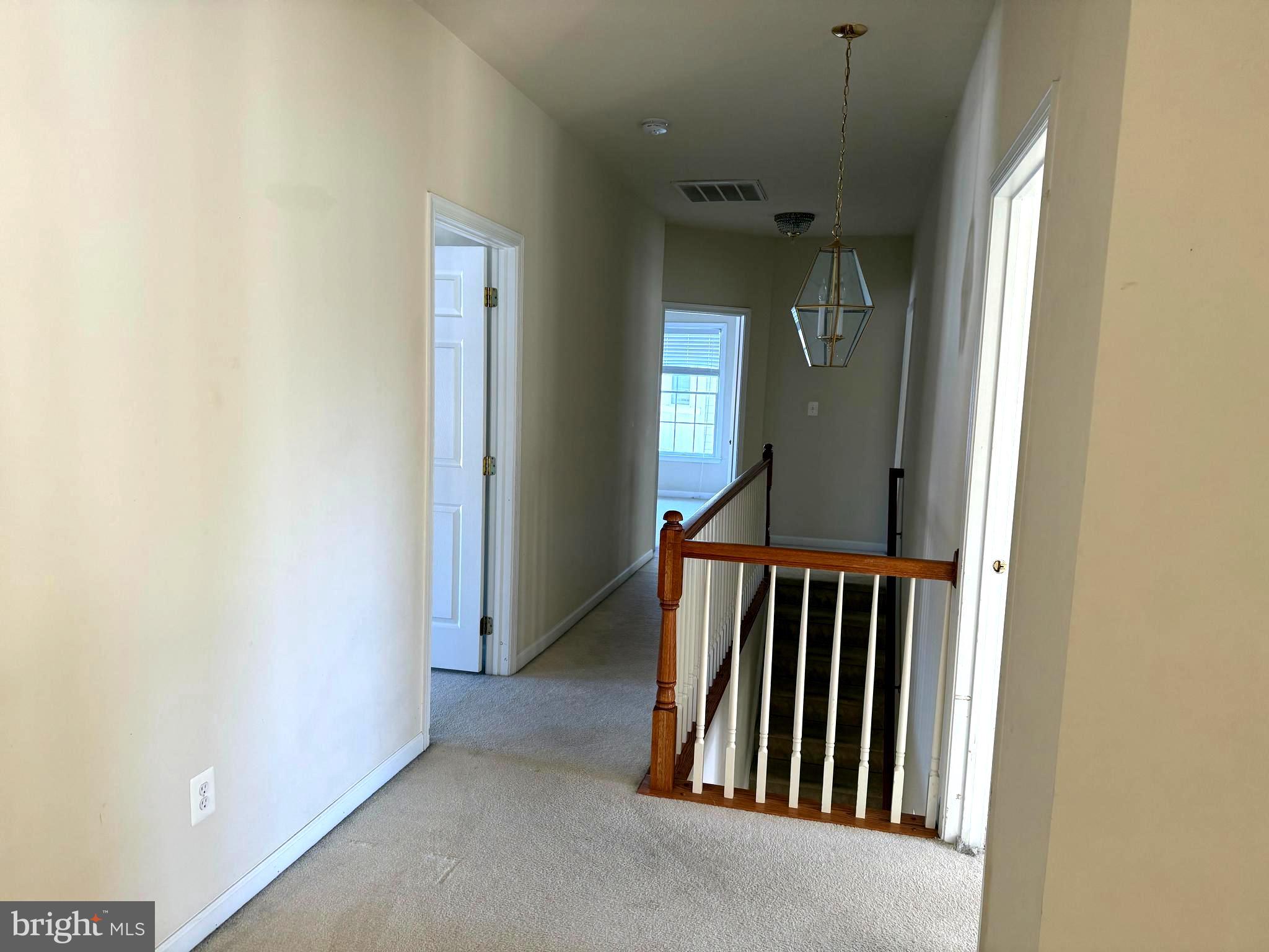 2635 Stoneridge Road Winchester, VA 22601 - Photo 18 of 21 Upper Hallway, front and rear stairs
