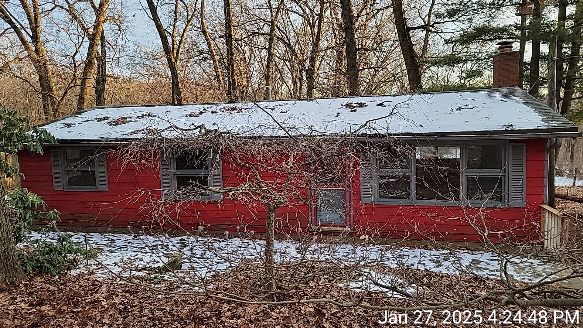 4976 West Schultz Road La Porte, IN 46350 - Photo 1 of 33 a view of a backyard with large trees