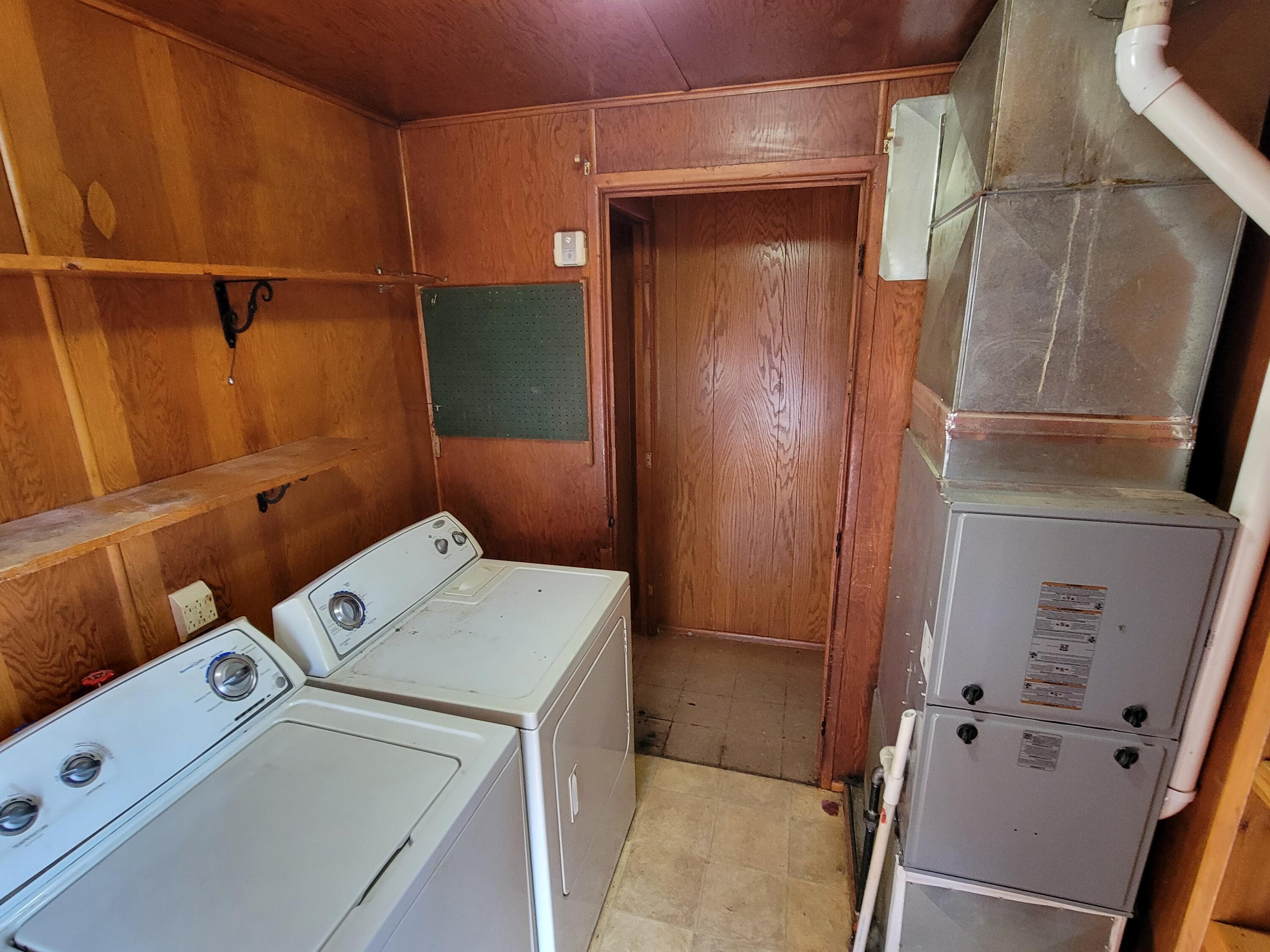 4976 West Schultz Road La Porte, IN 46350 - Photo 17 of 33 a utility room with dryer and washer