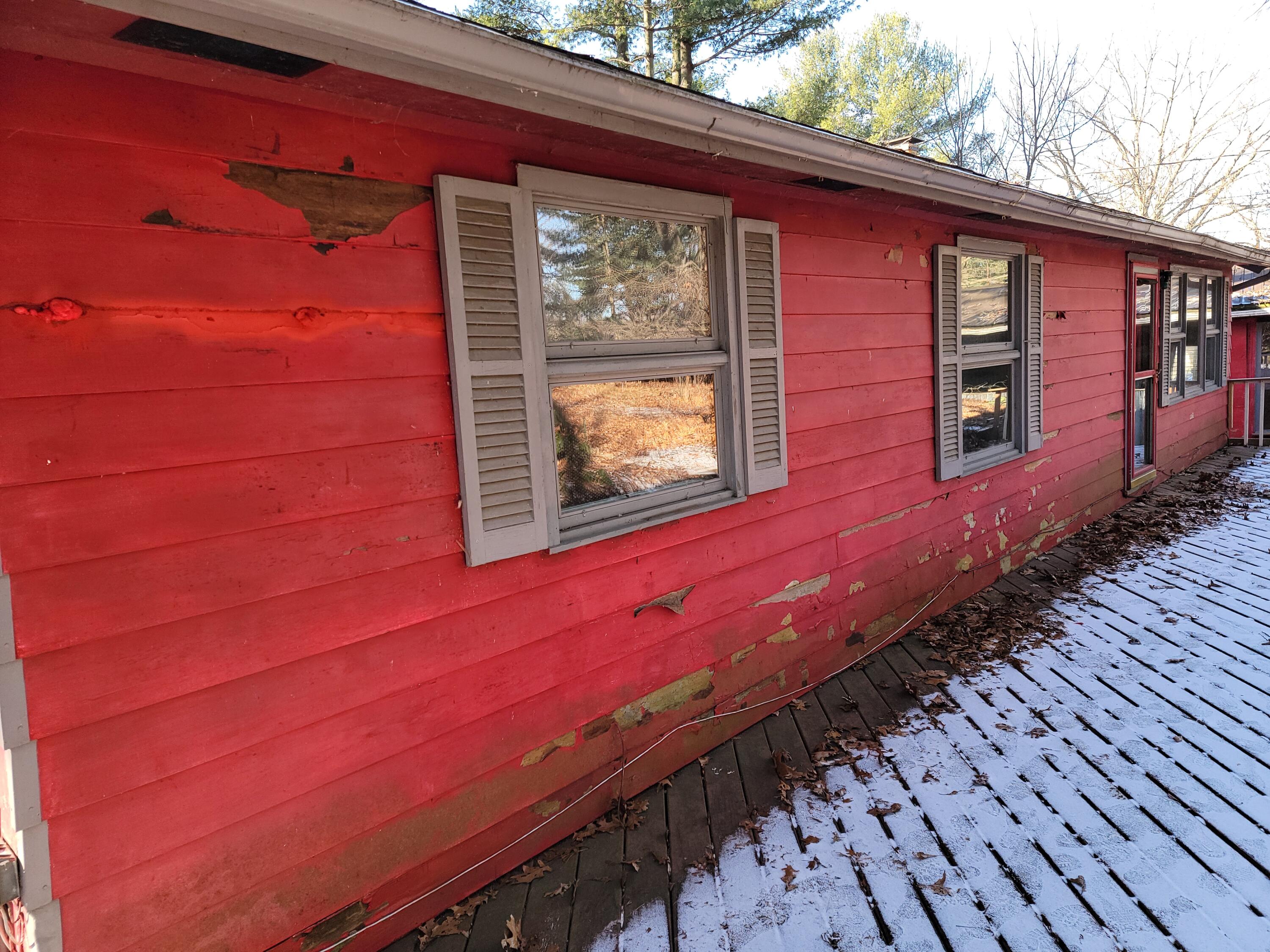 4976 West Schultz Road La Porte, IN 46350 - Photo 6 of 33 a view of a house with a window and wooden floor