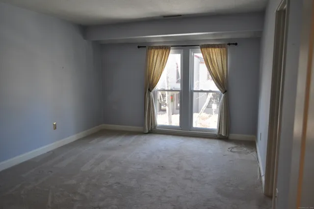 a view of empty room with window