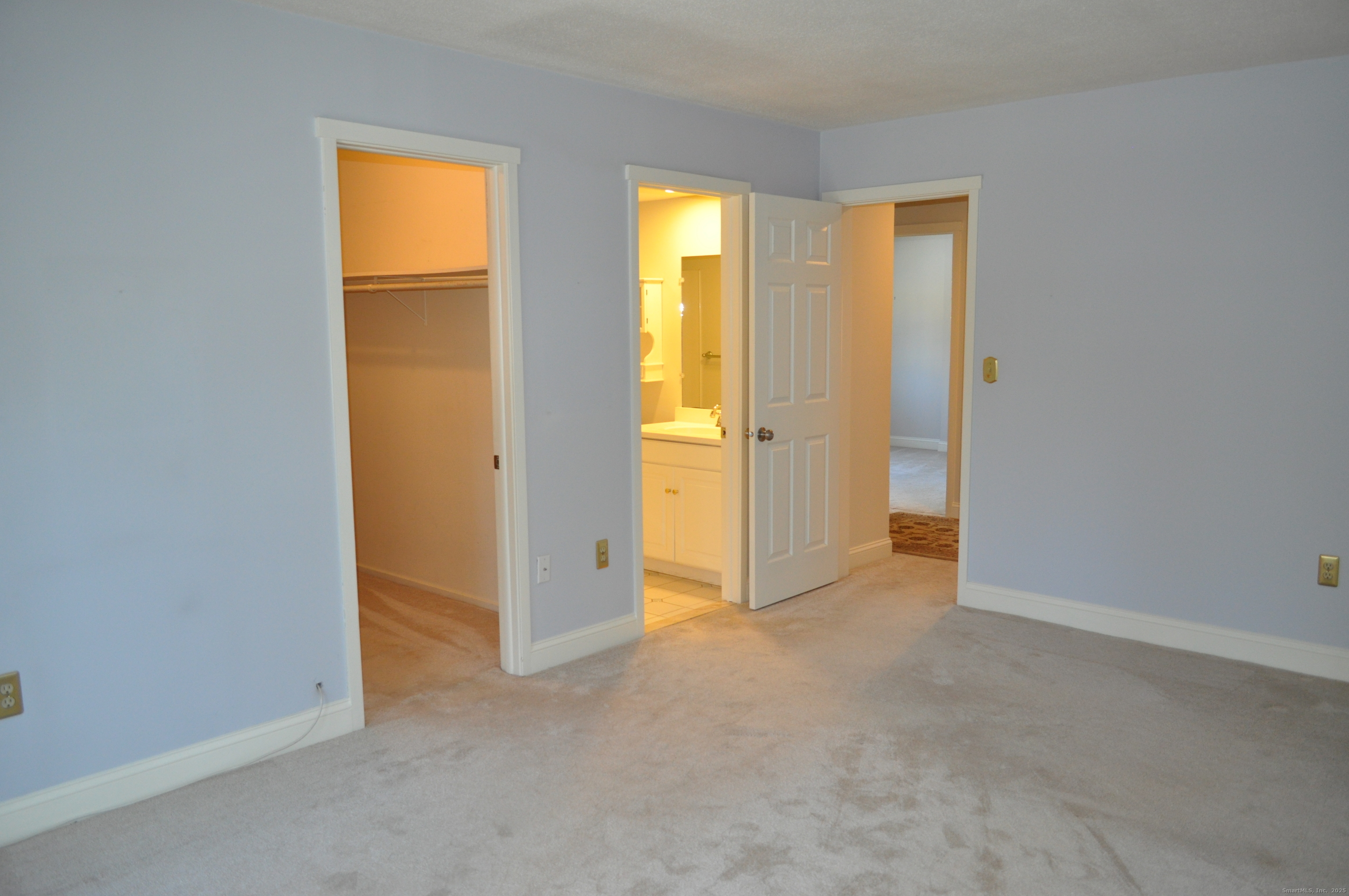 8 Willow Lane, Unit 8 Avon, CT 06001 - Photo 10 of 15 a view of empty room with window