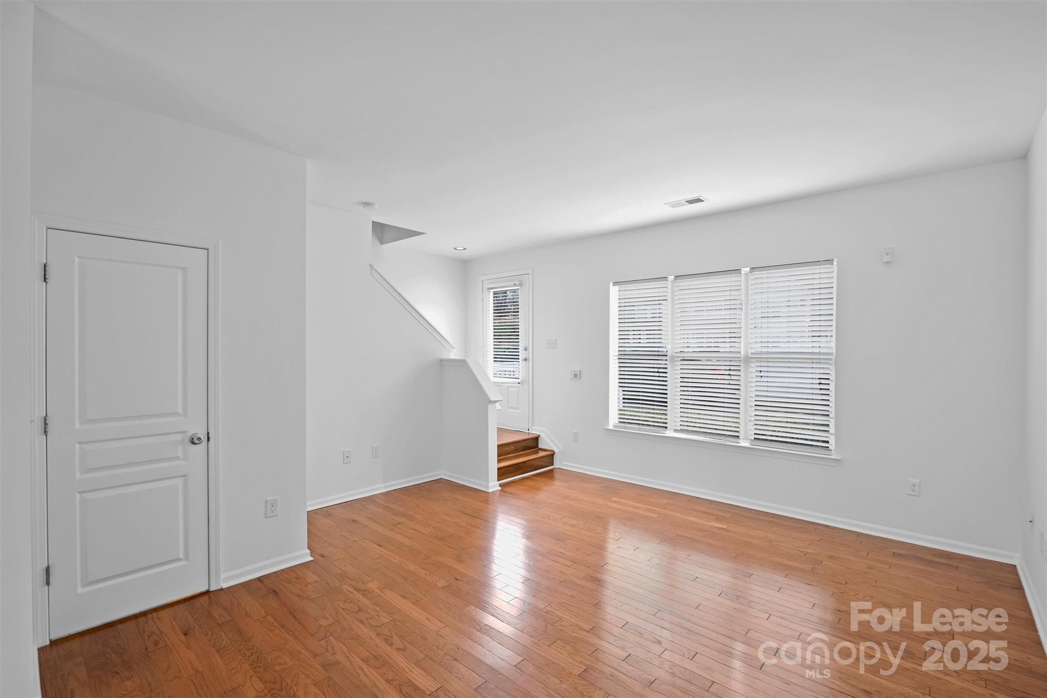 2252 Vision Drive Charlotte, NC 28203 - Photo 7 of 30 a living room with furniture and a window