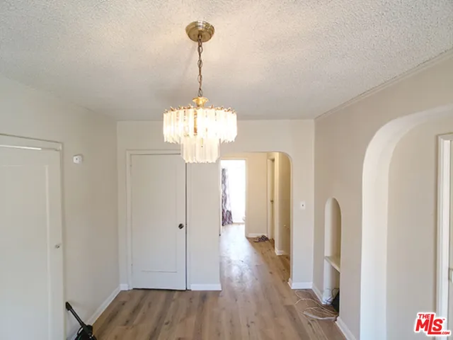 a view of a chandelier in a room