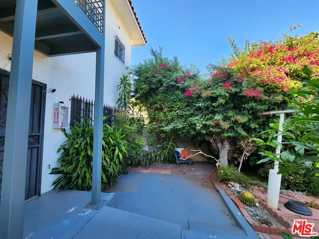 a view of a house with a small garden