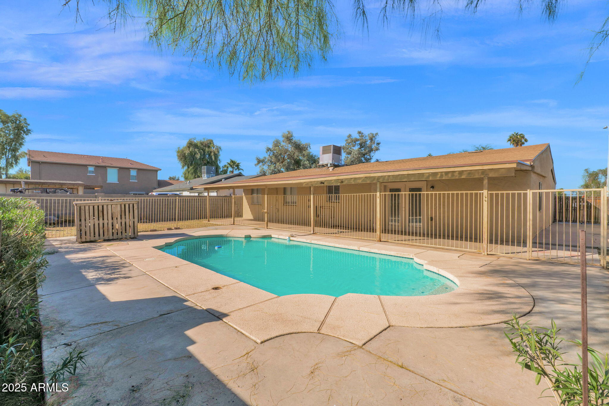 7221 Virginia Avenue Phoenix, AZ 85035 - Photo 28 of 33 a view of a house with a swimming pool