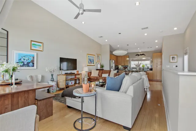a view of a hallway view with wooden floor and staircase