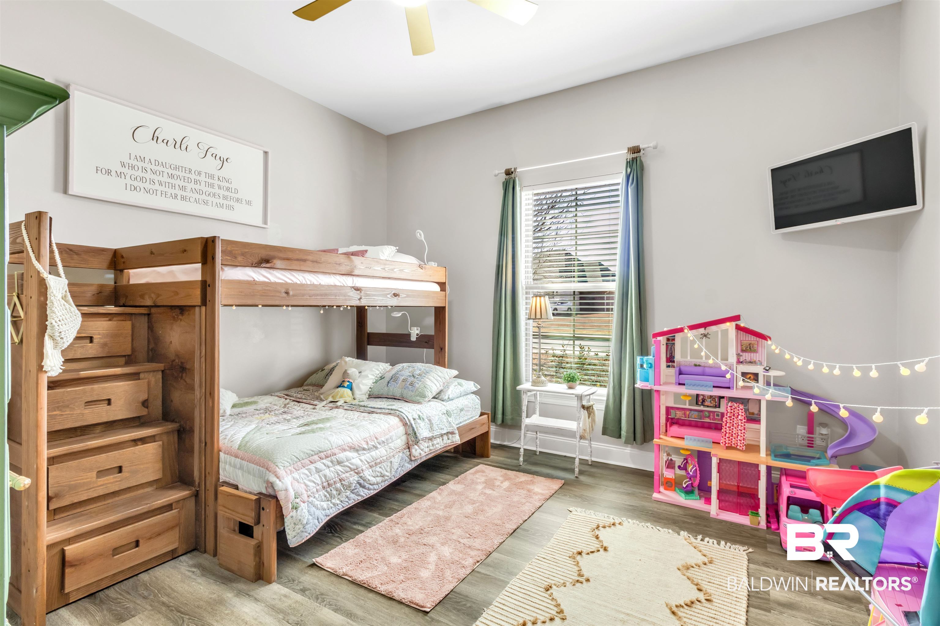 22531 Putter Lane Foley, AL 36535 - Photo 27 of 43 Bedroom featuring wood finished floors and ceiling fan