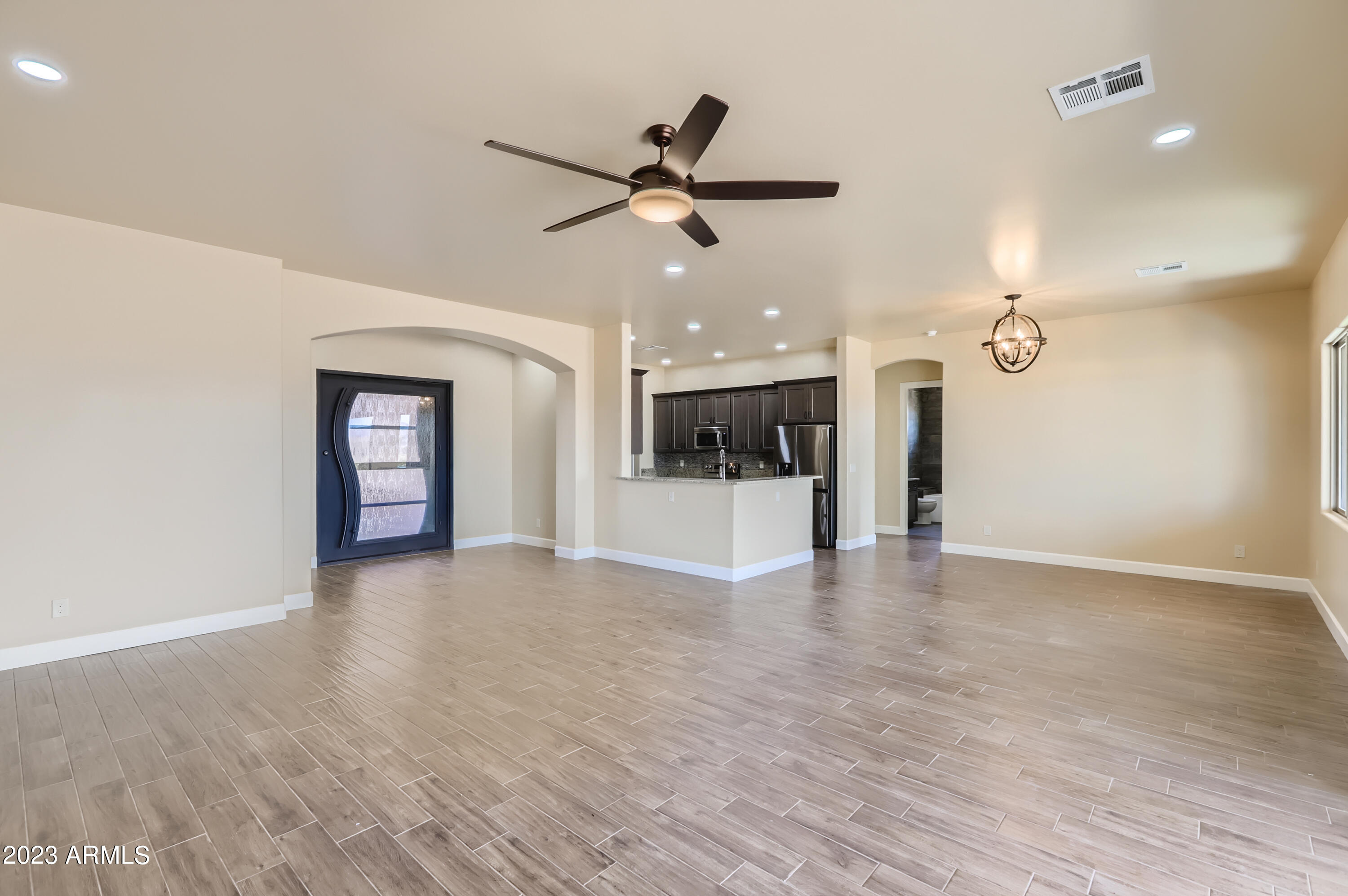 24029 West Redbird Road Wittmann, AZ 85361 - Photo 6 of 26 08 Living Room