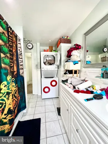 a kitchen with stainless steel appliances a sink and a stove