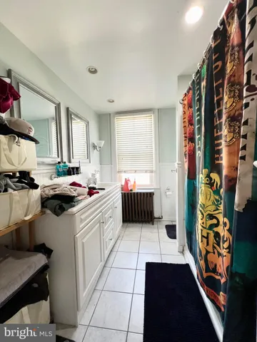 a bed room with a bed and a couch