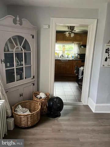 a kitchen with a sink a window and cabinets