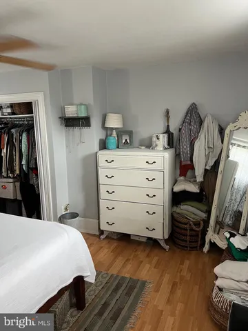 a bathroom with a toilet a sink and a shower