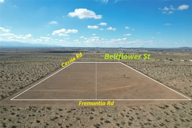a view of a swimming pool with an ocean view