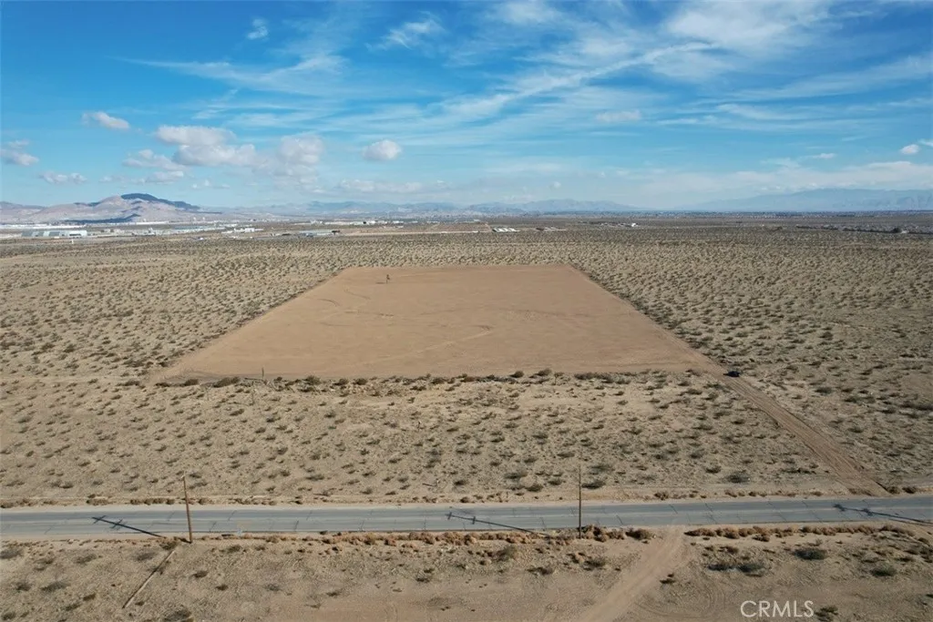 9 Bellflower Street Adelanto, CA 92301 - Photo 21 of 24 a view of ocean view with beach