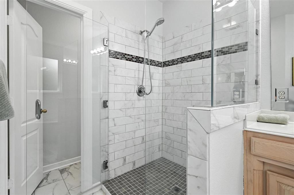 8974 Ranch Bluff Court Benbrook, TX 76126 - Photo 17 of 37 a bathroom with a shower