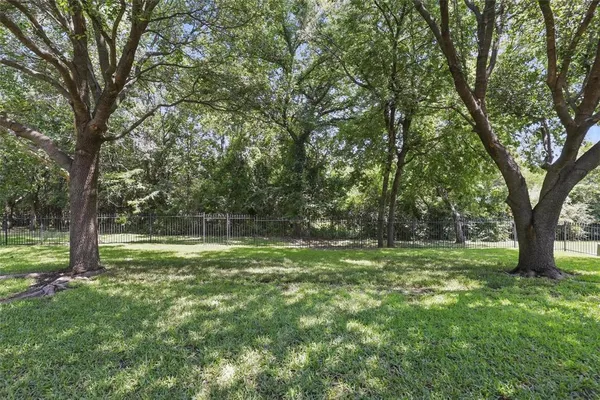 a view of outdoor space with deck and yard