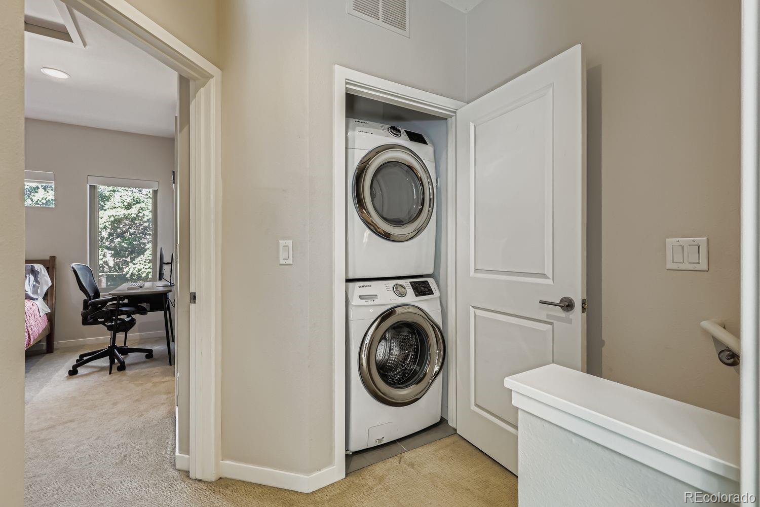 2715 Decatur Street Denver, CO 80211 - Photo 28 of 39 a utility room with sink dryer and washer