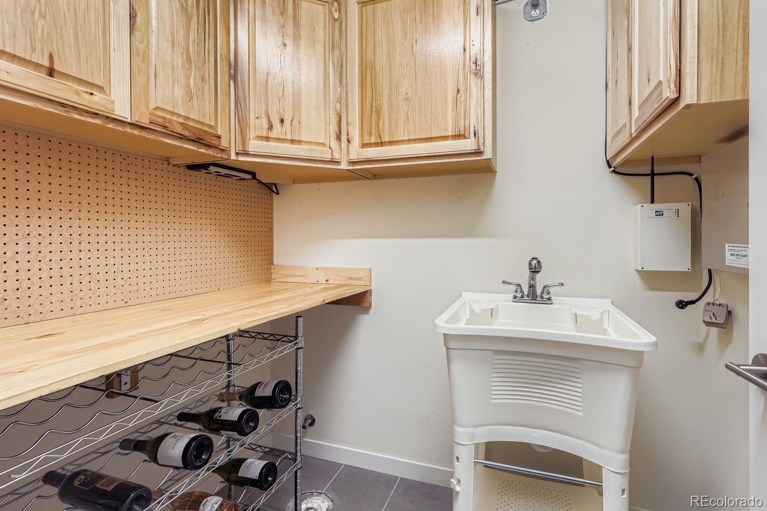 2715 Decatur Street Denver, CO 80211 - Photo 29 of 39 a bathroom with a sink and a mirror