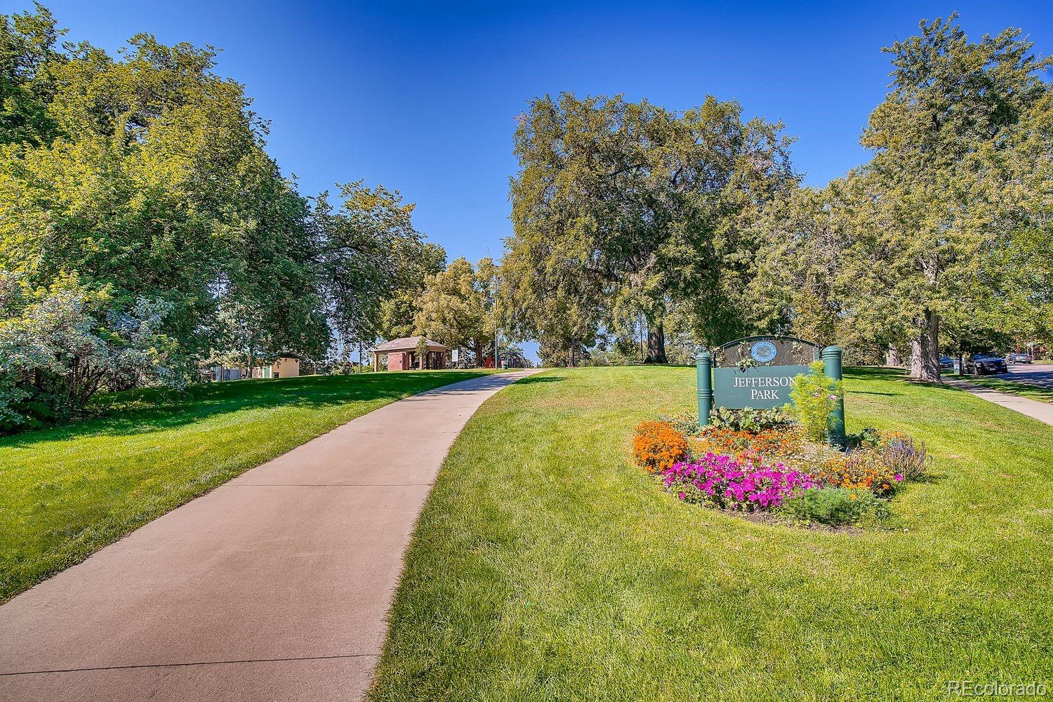 2715 Decatur Street Denver, CO 80211 - Photo 31 of 39 a small garden covered with tall trees