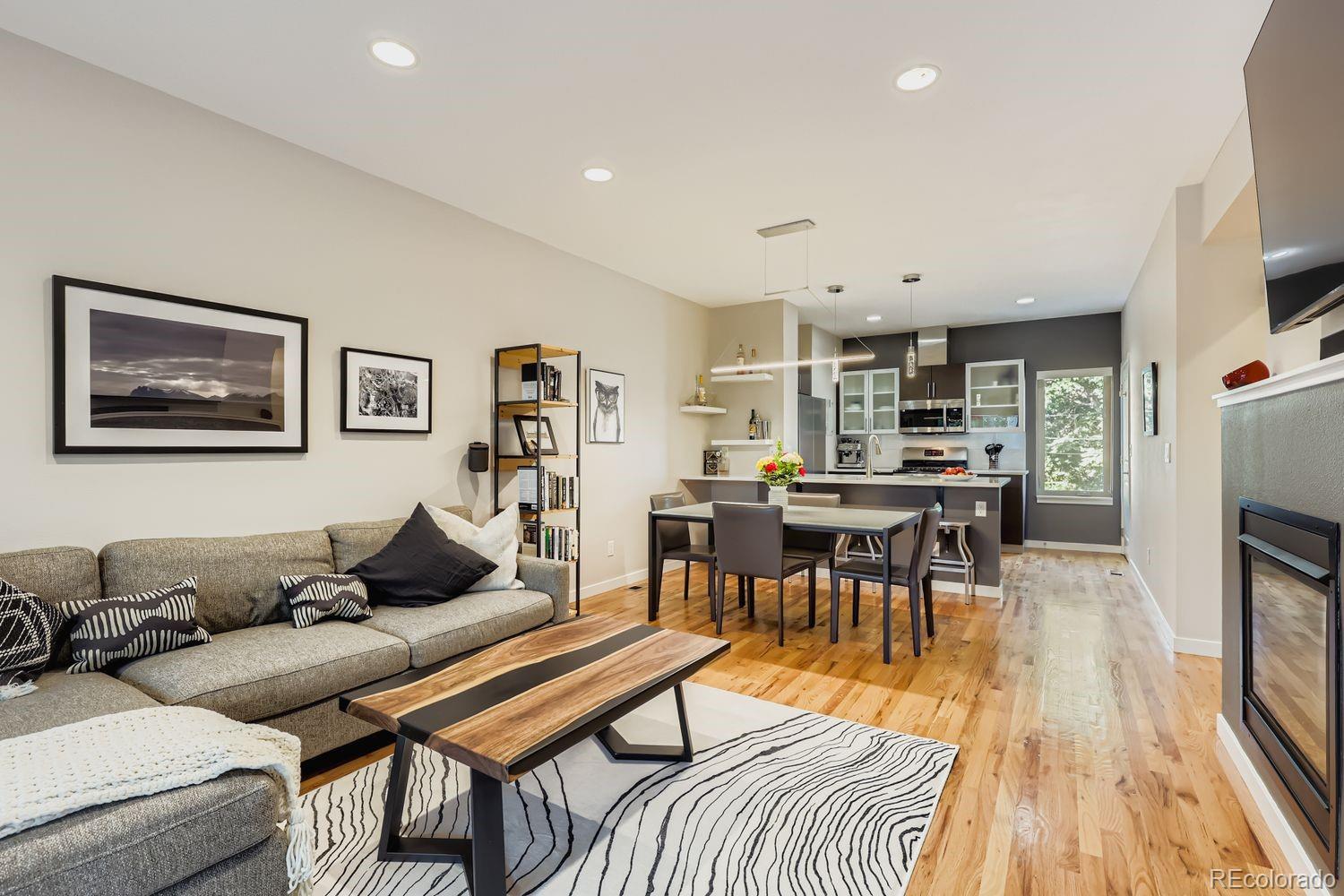 2715 Decatur Street Denver, CO 80211 - Photo 5 of 39 a living room with furniture and a wooden floor