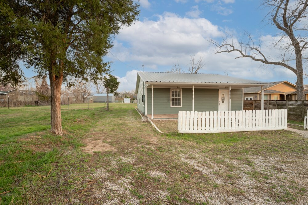 207 Harris Street Elgin, TX 78621 - Photo 3 of 19 a view of outdoor space in front of house