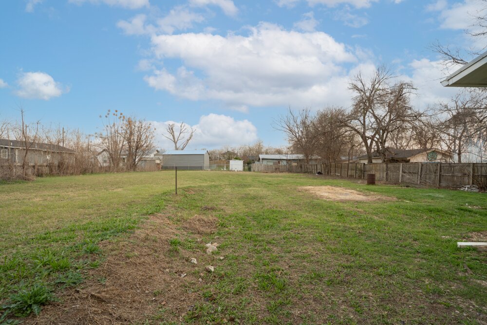207 Harris Street Elgin, TX 78621 - Photo 4 of 19 a view of a golf course