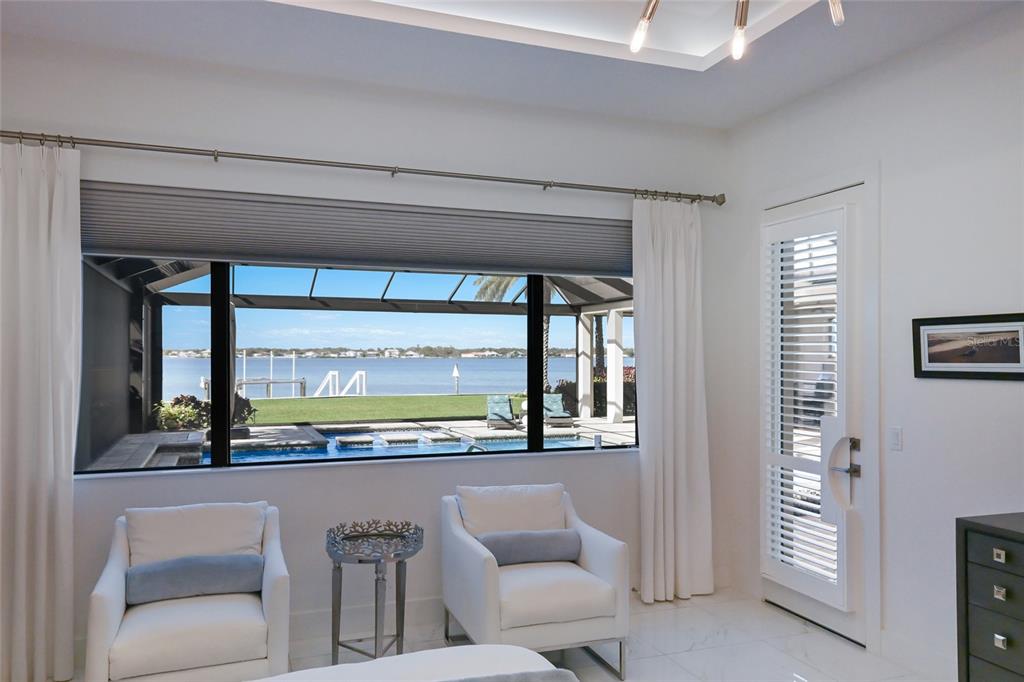 700 Regatta Way Bradenton, FL 34208 - Photo 25 of 78 a living room with furniture and a large window