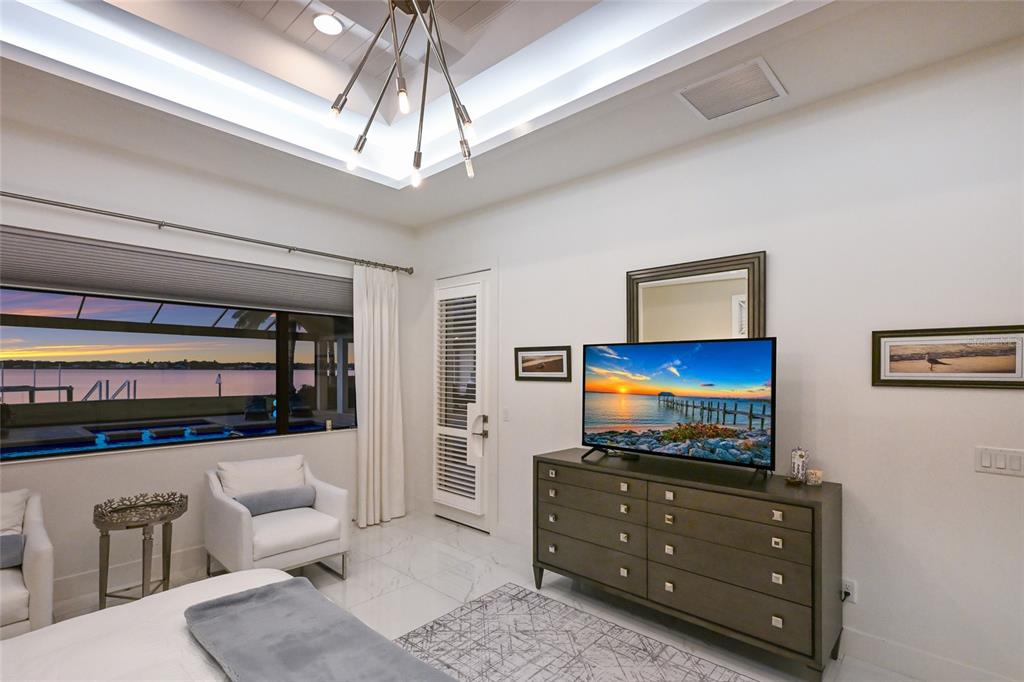 700 Regatta Way Bradenton, FL 34208 - Photo 26 of 78 a living room with furniture and a flat screen tv