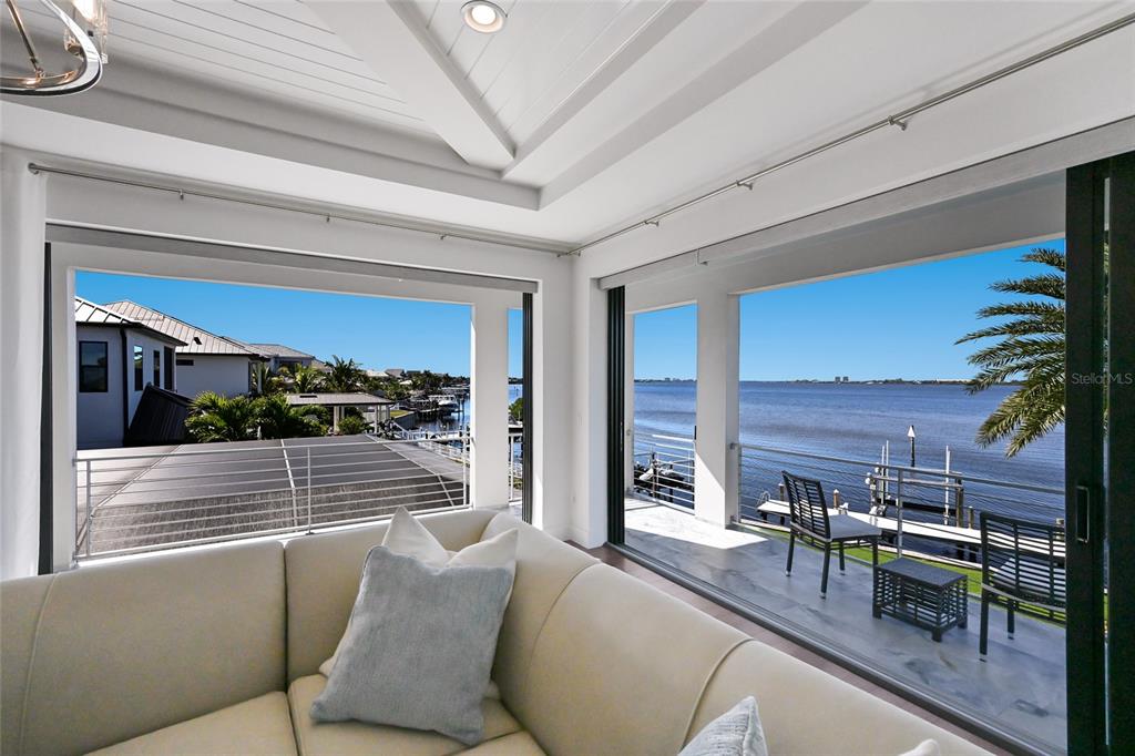700 Regatta Way Bradenton, FL 34208 - Photo 47 of 78 a view of a living room and a balcony