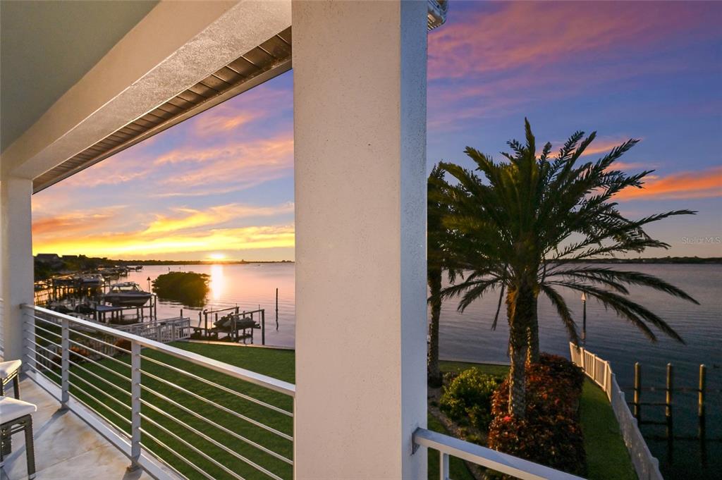 700 Regatta Way Bradenton, FL 34208 - Photo 50 of 78 a view of a balcony with potted plants