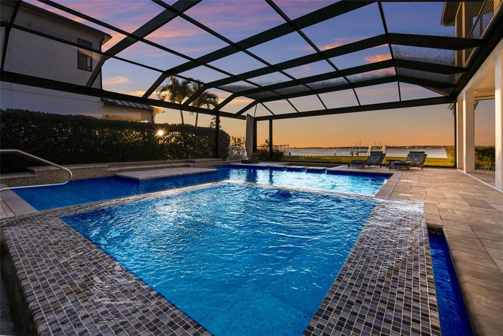 700 Regatta Way Bradenton, FL 34208 - Photo 68 of 78 a view of a swimming pool with a patio