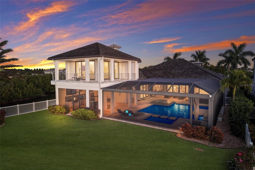 700 Regatta Way Bradenton, FL 34208 - Photo 75 of 78 a front view of a house with a yard