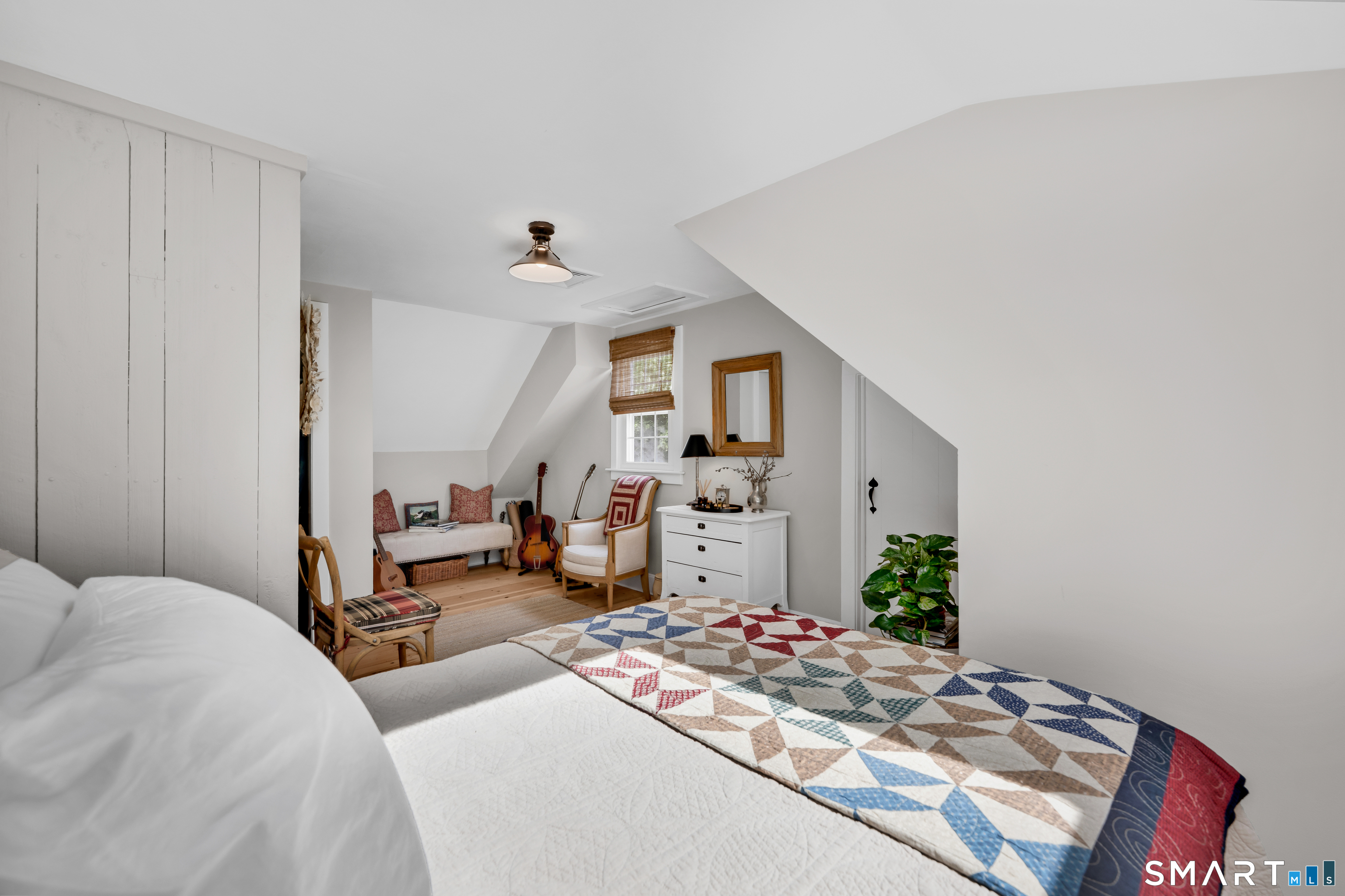 1000 Bassett Road Watertown, CT 06795 - Photo 21 of 35 a bedroom with furniture and a potted plant