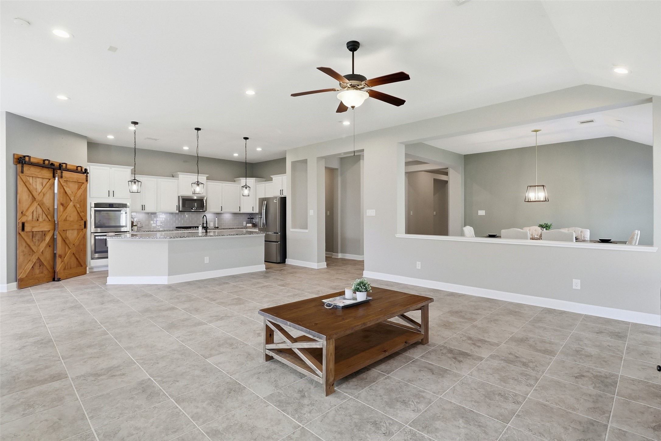 24126 Cane Fields Road Katy, TX 77493 - Photo 15 of 36 Sophisticated open living designed for modern lifestyles.