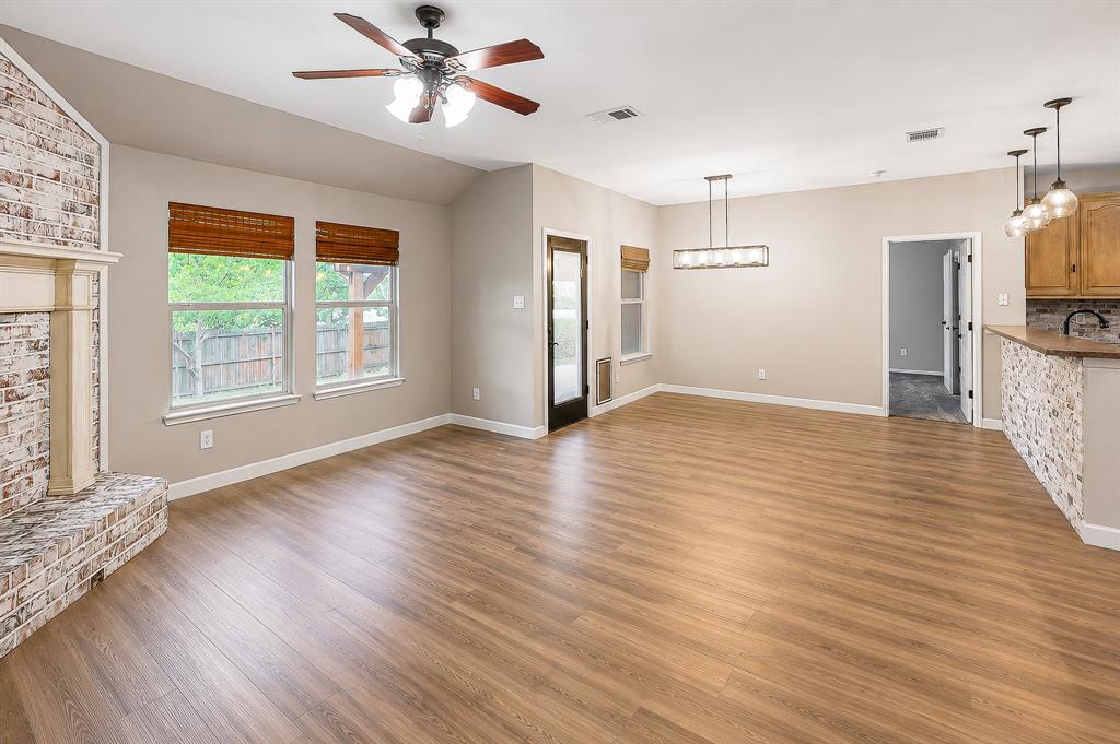 1070 Shepard Lane Lavon, TX 75166 - Photo 11 of 29 a view of empty room with wooden floor and fan