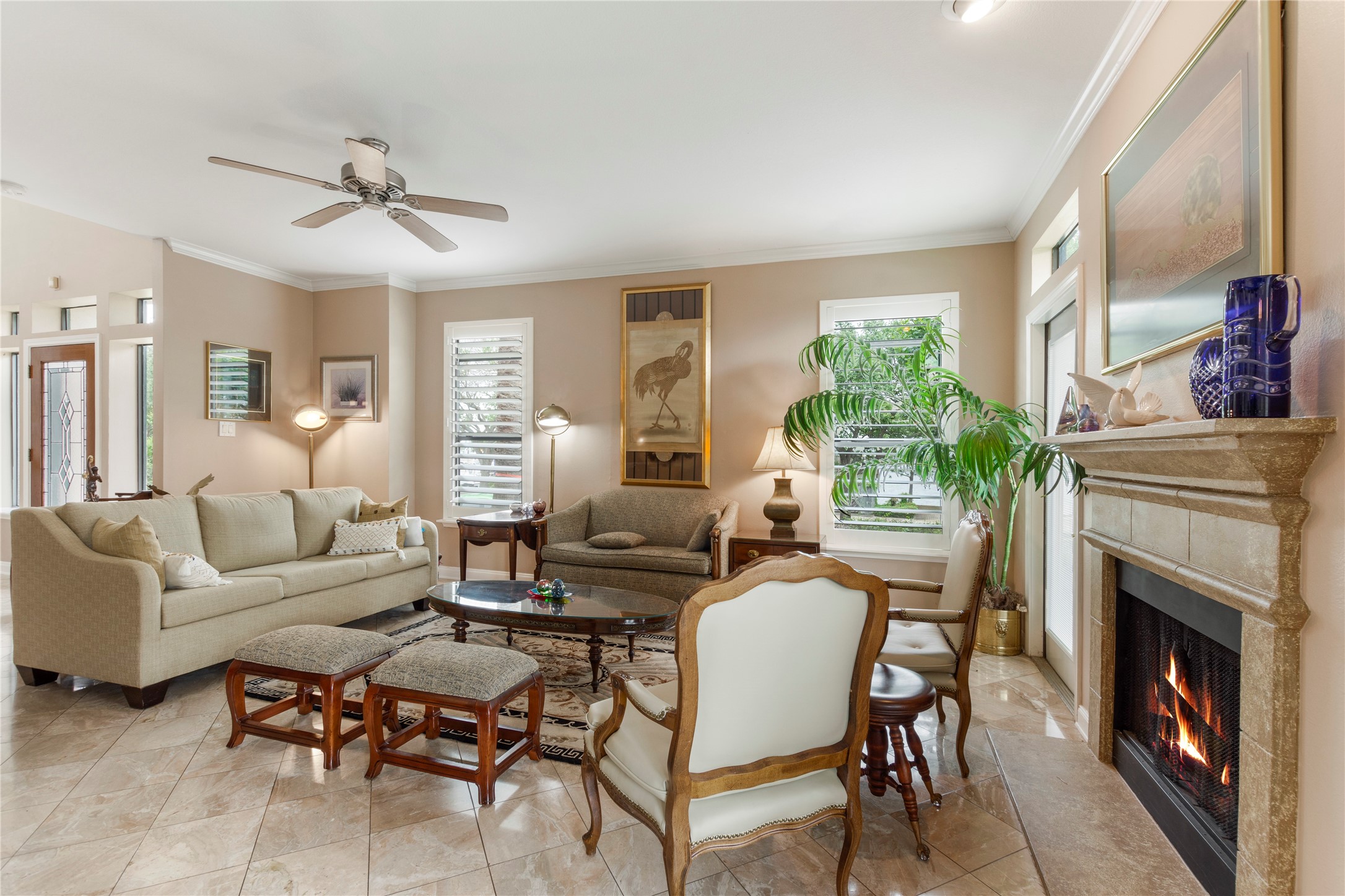 457 Mariners Drive Kemah, TX 77565 - Photo 6 of 25 Bright Family room with fireplace and marina views.