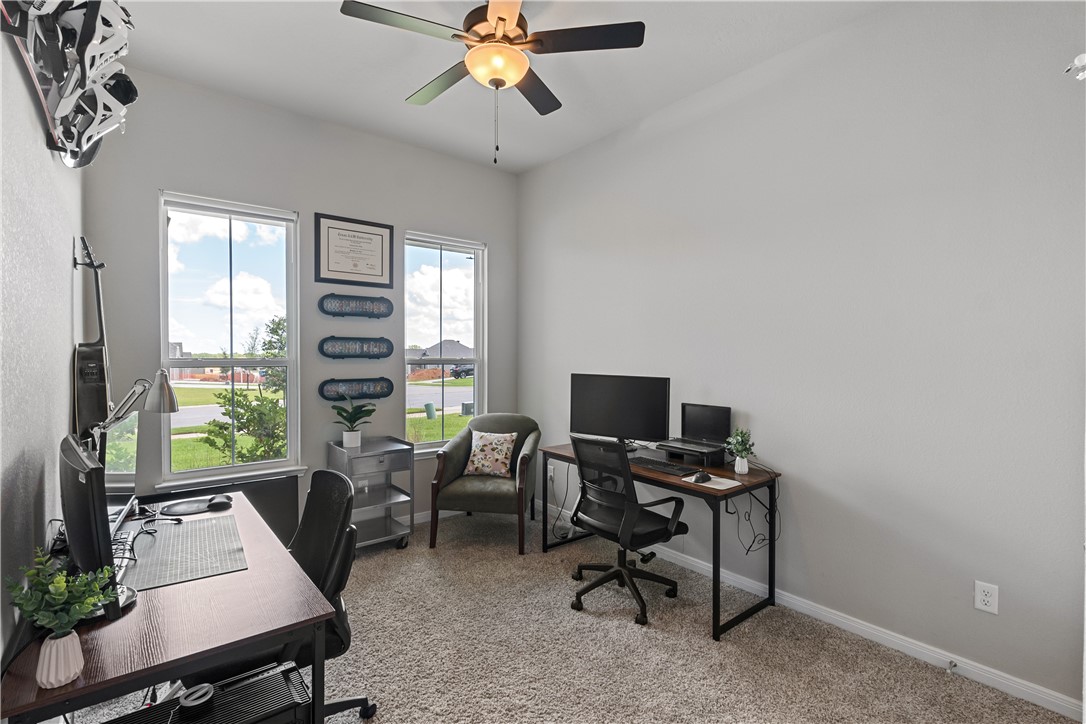 4746 Holm Oak Road College Station, TX 77845 - Photo 16 of 25 a view of a workspace with furniture and a window