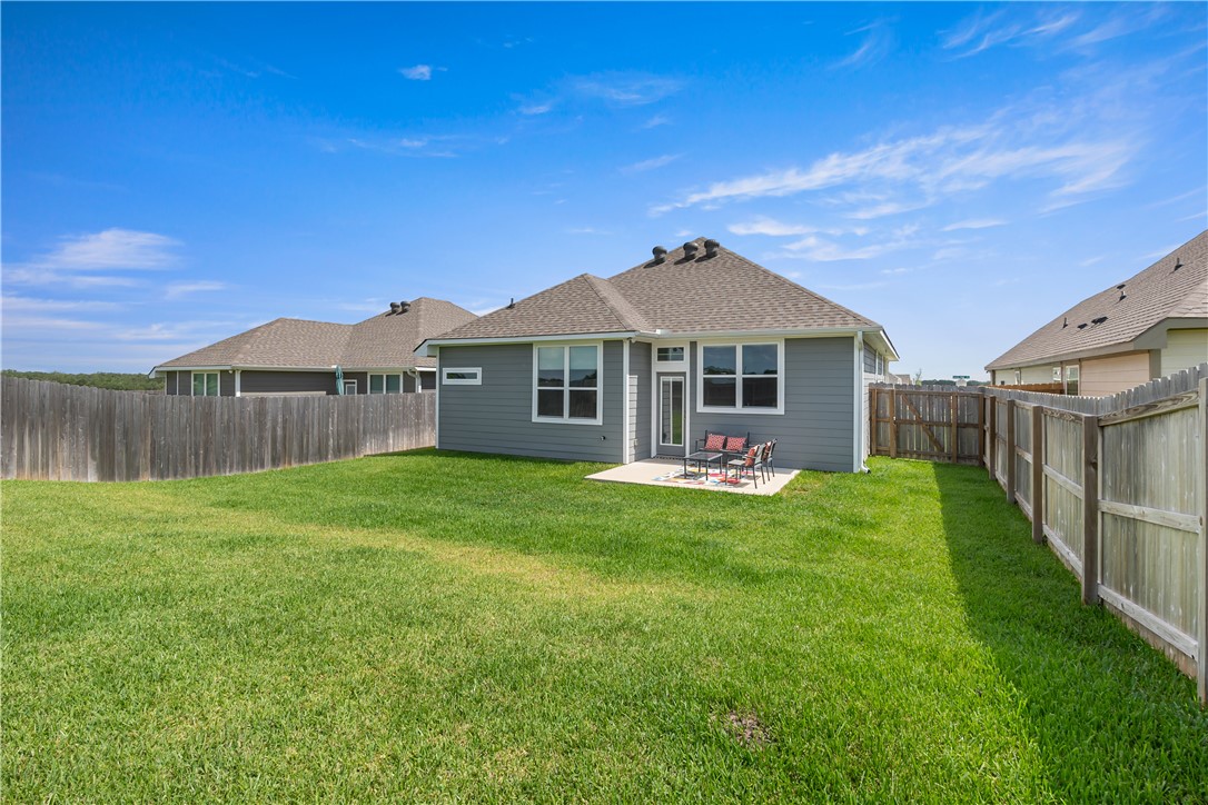 4746 Holm Oak Road College Station, TX 77845 - Photo 25 of 25 a front view of a house with a garden