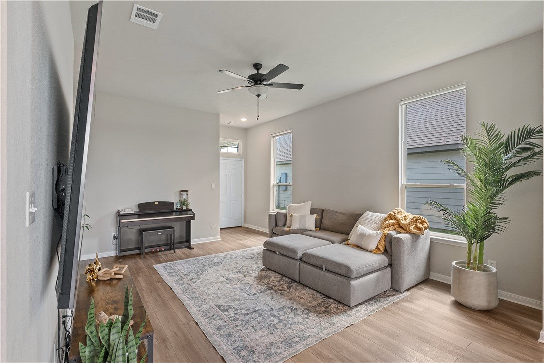 4746 Holm Oak Road College Station, TX 77845 - Photo 8 of 25 a living room with furniture and a table