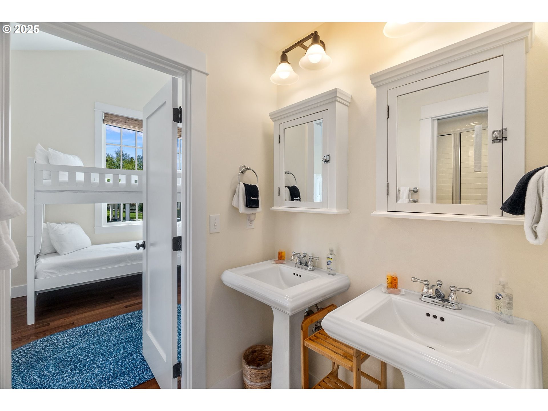 81 Compass Street Pacific Beach, WA 98571 - Photo 20 of 47 a bathroom with a tub sink and mirror