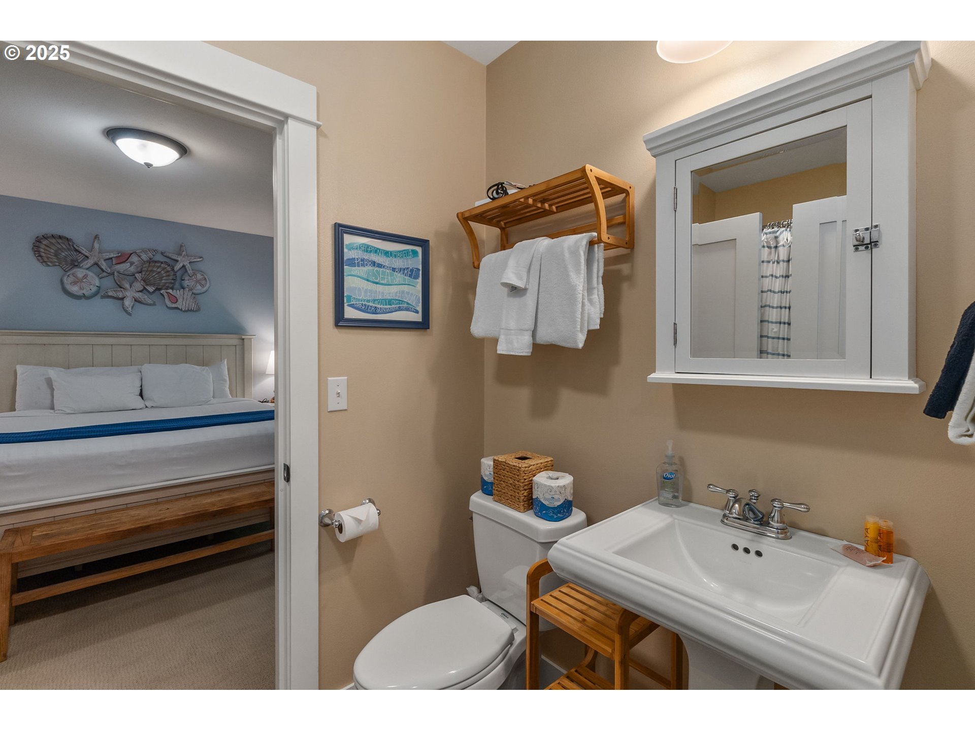81 Compass Street Pacific Beach, WA 98571 - Photo 26 of 47 a bathroom with a sink mirror and toilet
