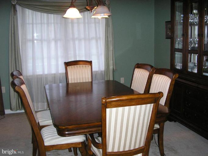 7501 Scotts Farm Road Spotsylvania, VA 22553 - Photo 11 of 23 Separate dining room opposite living room