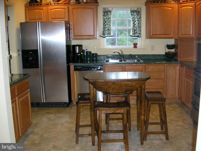 7501 Scotts Farm Road Spotsylvania, VA 22553 - Photo 12 of 23 Kitchen is the heart of this home, table space